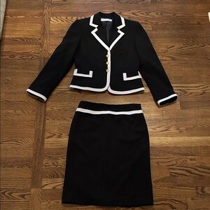 Elegant Black Two-Piece Skirt Suit with White Trim